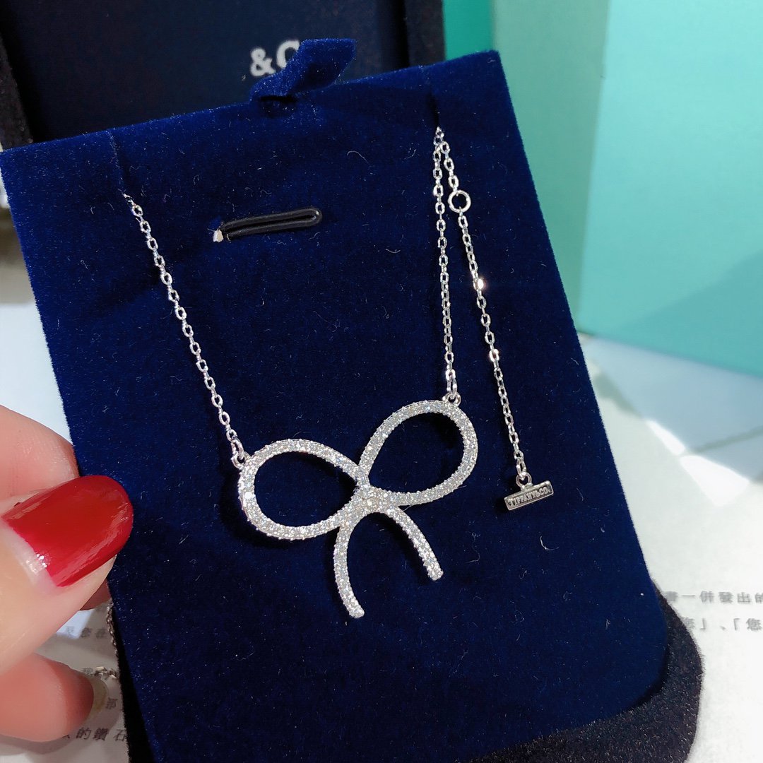 [Renovia Jewelry]CLAW SET RHODIUM PLATED BOW NECKLACE