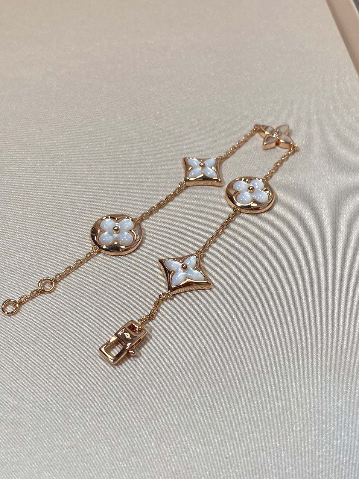 [Renovia Jewelry]STAR AND SUN 5 MOTIF MOP PINK GOLD BRACELET
