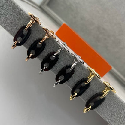 [Renovia Jewelry]BROWN PIG NOSE EARRINGS