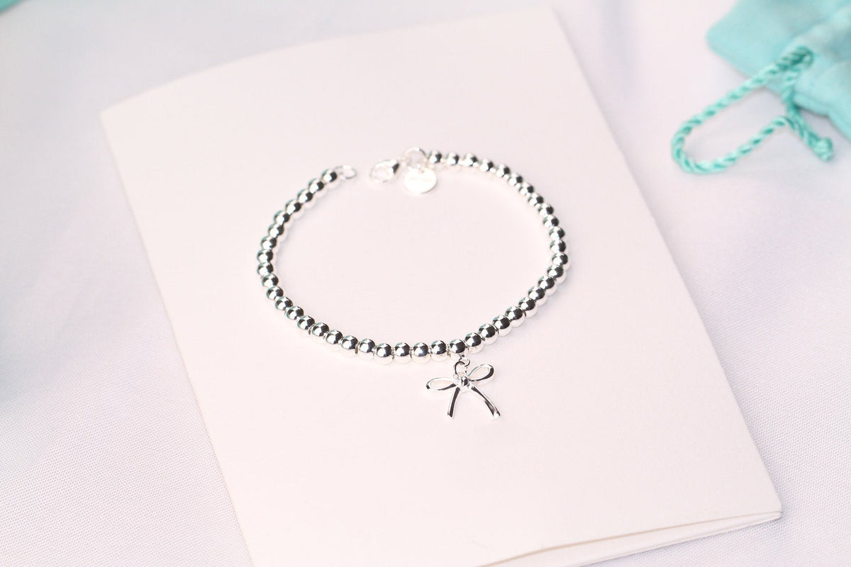 [Renovia Jewelry]STERLING SILVER BOW BEAD BRACELET